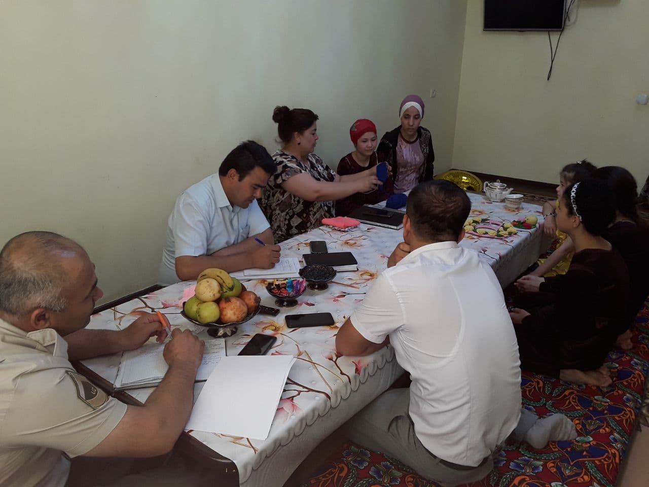 Officials visited the Behbutovs and the Ochilovs